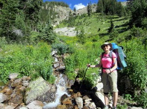 Nearing the bottom of the first set of switchbacks.  My smile is waning - ha!  My feet were killing me. 